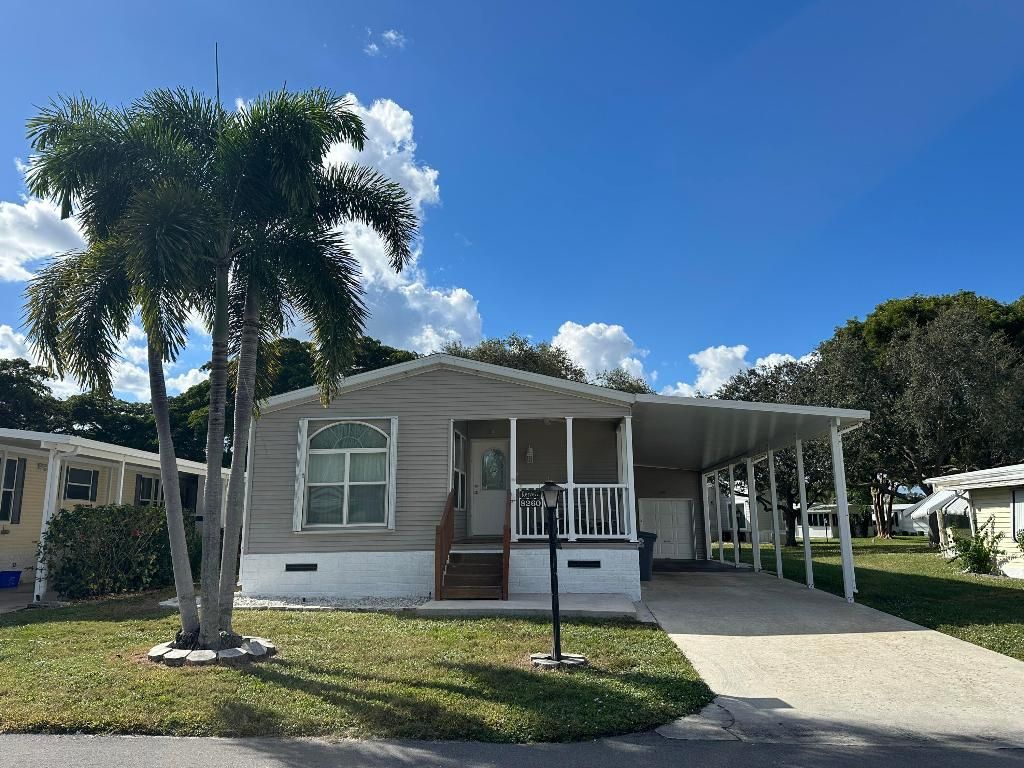 Photo of 8260 E Club Road, Boca Raton, FL 33433 (MLS # R11141790)