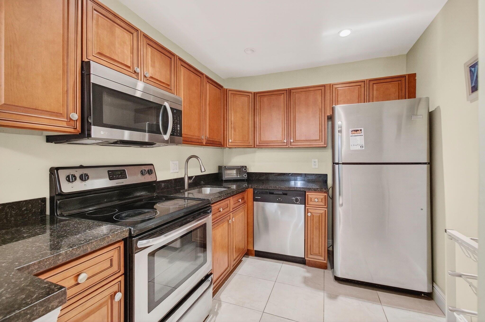 BEAUTFULLY KEPT 2/2 CONDO W/ OPEN FLOOR PLAN & TASTEFULLY FURNISHED. UPDATED KITCHEN W/ WOOD CABINETRY, GRANITE COUNTER TOPS & STAINLESS-STEEL APPLIANCES OPEN UP TO AN OVERSIZED DINING/ LIVING AREA. SLIDING DOORS BRING IN AN ABUNDANCE OF NATURAL LIGHT MAKING THE CONDO VERY BRIGHT AND COMFORTING TAKE YOU OUT TO THE WIDE SCREENED BALCONY W/ RELAXING VIEWS OF THE POOL AND LUSH GREENERY. FAUX WOOD FLOORING IN BEDROOMS & LIVING AREA FOR EXQUISITE STYLE AND EASY MAINTENANCE. LARGE BEDROOMS & BATHROOMS ONE ON EACH SIDE OF THE CONDO FOR MAXIMUM PRIVACY. IDEAL LOCATION JUST MINUTES FROM UNIVERSITY, DOWNTOWN BOCA RATON & IT'S WORLD-FAMOUS BEACHES, RESTAURANTS & NITE LIFE. PERFECT FOR INVESTORS AS CONDO RULES ALLOW FOR IMMEDIATE RENTING.