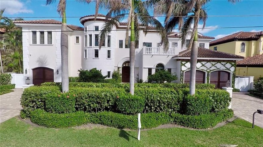 Gorgeous Deepwater home in Lighthouse Point! This elegant 5 bed, 5.5 bath home offers a stunning new kitchen w/ Sub Zero and Wolf appliances, designer moldings throughout, elevator, theater, grand marble Staircase with stained glass ceiling and so much more! Master bedroom features spa like bathroom, His/Hers Closets w/Elfa Cabinetry, large Balconies w/water views.  The gorgeous backyard is perfect for entertaining with a resort style pool/spa, dock 20k lb boat lift and lush landscaping.