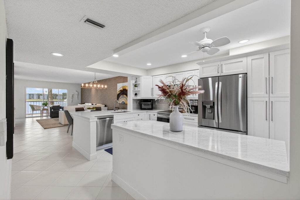 Photo of 6121 Pointe Regal Circle #201, Delray Beach, FL 33484 (MLS # R11142608)