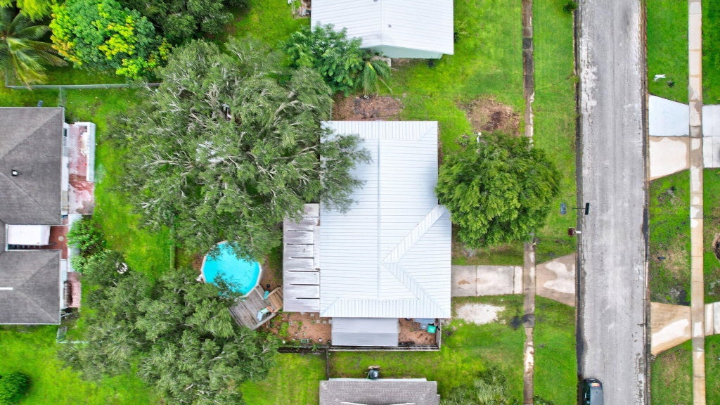 Photo of 301 NE Midfield Lane, Port Saint Lucie, FL 34983 (MLS # R11024487)