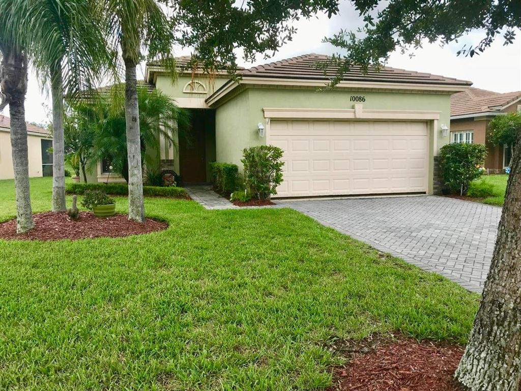 Photo of 10086 SW Chadwick Drive, Port Saint Lucie, FL 34987 (MLS # R10763282)
