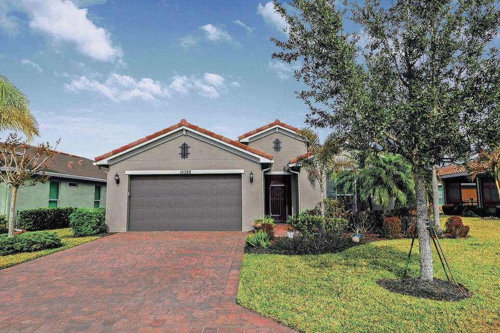 Photo of 10288 SW Yellowwood Avenue, Port Saint Lucie, FL 34987 (MLS # R11164805)