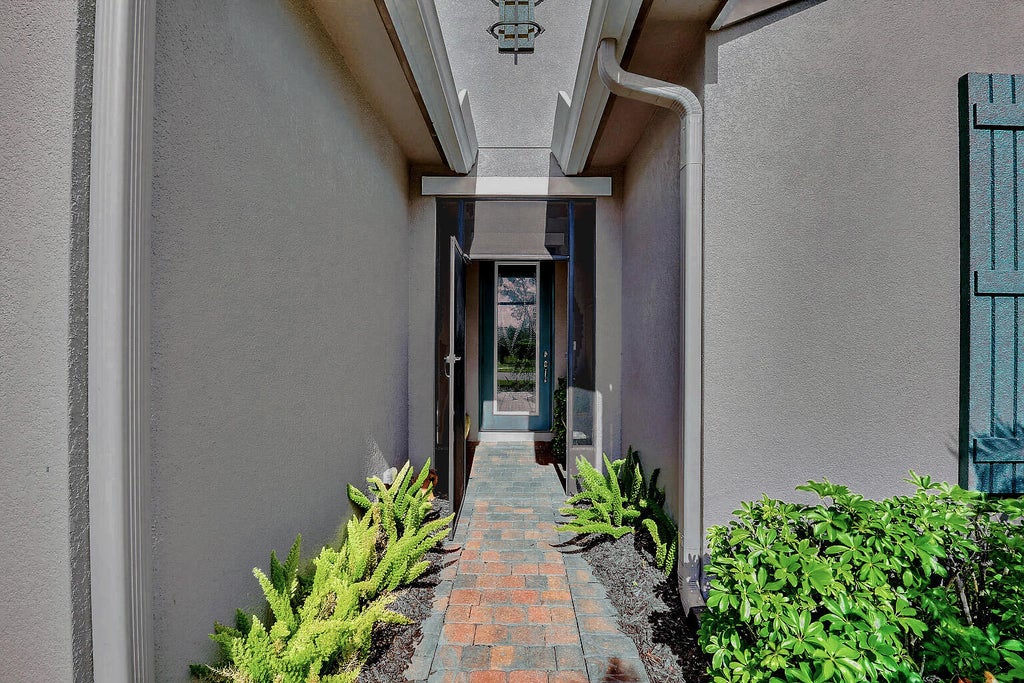 Photo of 10288 SW Yellowwood Avenue, Port Saint Lucie, FL 34987 (MLS # R11164805)
