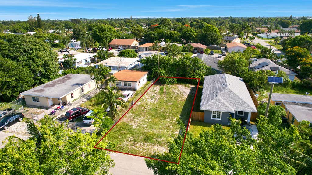 Photo of 1141 Peak Road, Lake Worth, FL 33462 (MLS # B26045653)