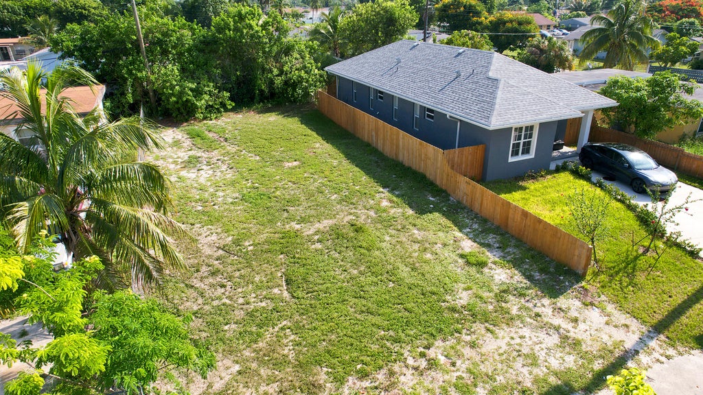 Photo of 1141 Peak Road, Lake Worth, FL 33462 (MLS # B26045653)
