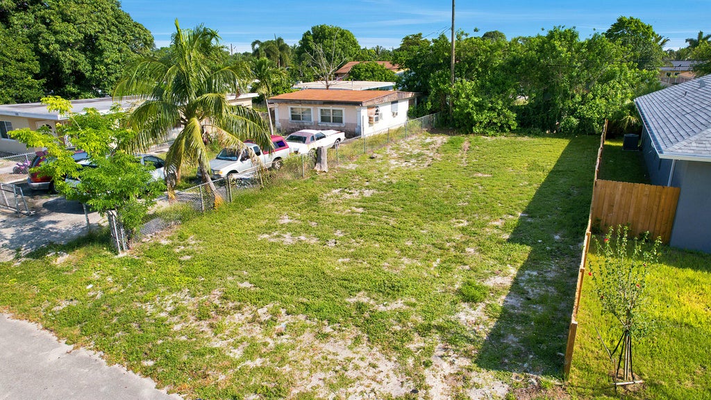Photo of 1141 Peak Road, Lake Worth, FL 33462 (MLS # B26045653)