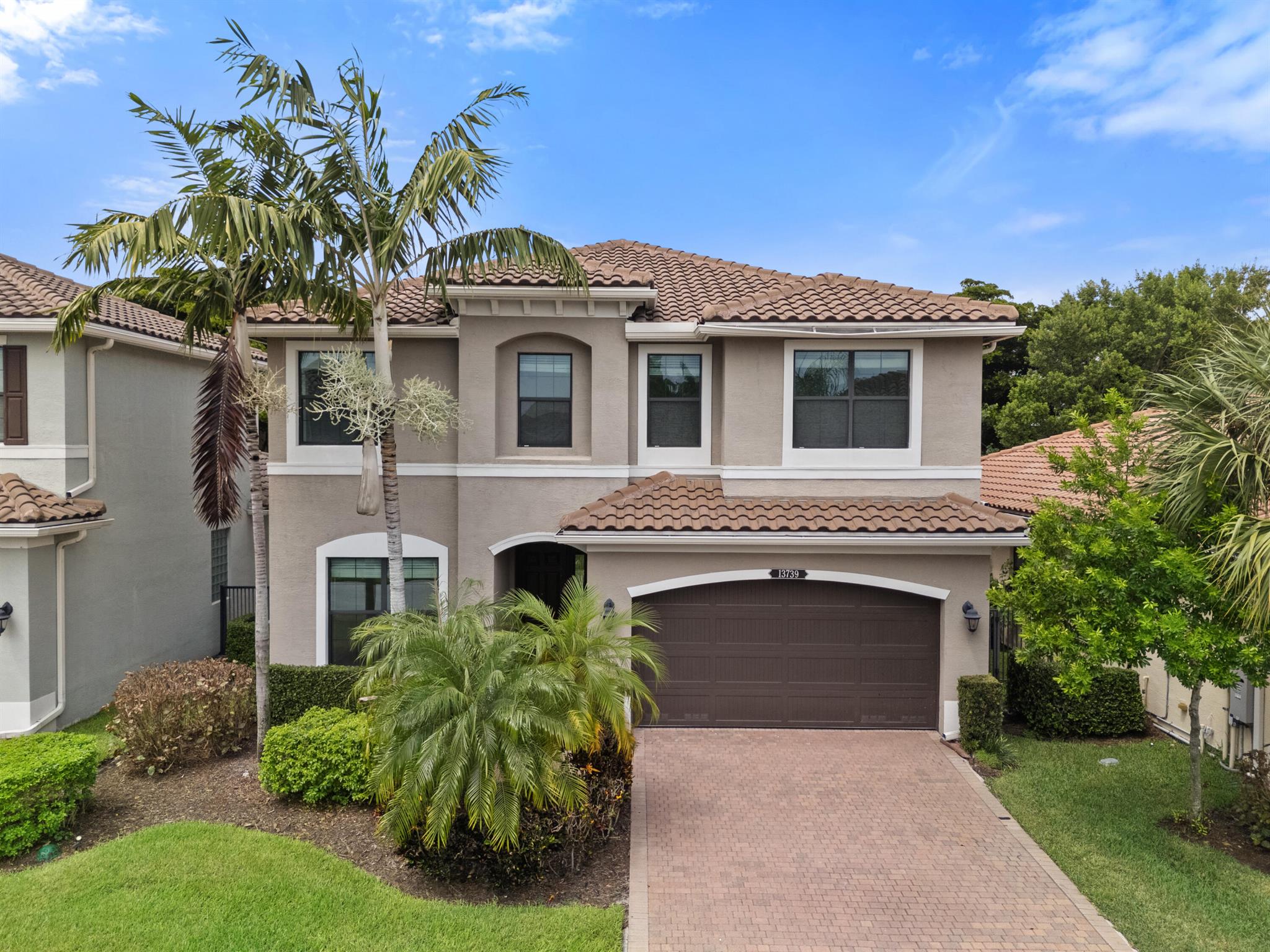 Come experience luxury living in this beautifully upgraded Capri model, the largest floor plan available in the highly sought-after Tuscany North community. This executive home offers 5 spacious bedrooms (including one on the main level), 4 full bathrooms. Brand new paint throughout and LED recessed lighting in every room. It also features large kitchen with 42'' cabinetry, granite countertops as well as a large island, perfect for entertaining. Upgraded closet systems in most bedrooms. Impact windows and doors throughout, making it very quiet inside the house. Commnity amenities include resort style pool, splash pad, clubhouse, fitness center, tennis, basketball and playgrounds. Great schools and shops nearby. Close to Turnpike for easy access.