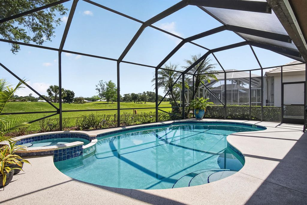 Photo of 9434 Poinciana Court, Fort Pierce, FL 34951 (MLS # B26021323)