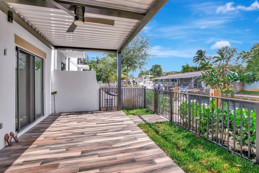 Photo of 4444 E Aqua Bella Lane, Dania Beach, FL 33312 (MLS # F10509258)