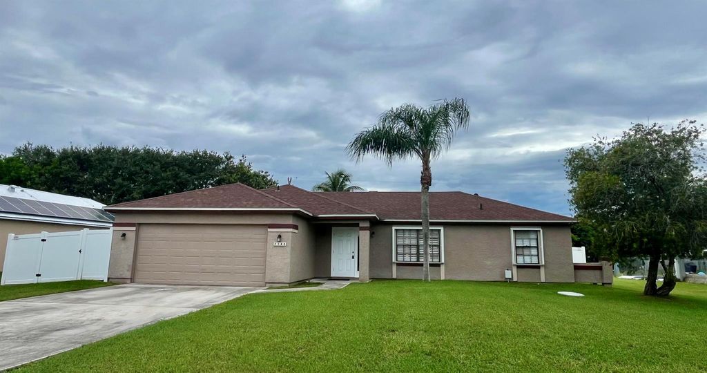 Photo of 2340 SE Charleston Drive, Port Saint Lucie, FL 34952 (MLS # R10998951)