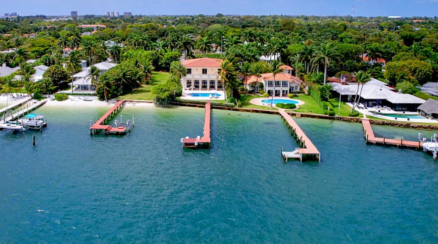 Enjoy wide open intracoastal views overlooking Palm Beach estate homes at this rare direct waterfront 6BR/6.1BA estate with 70' +/- of direct Intracoastal frontage. Built new in 2007, this offering includes a deep water dock and is just minutes to the Palm Beach inlet. The home is replete with a gated entry, elevator, chef's kitchen, fantastic outdoor spaces, perfect for entertaining, with an oversized balcony, covered loggia, a separate guest/staff suite with a full kitchen that sits above the garage, a large pool, all with spectacular views of the Intracoastal Waterway.