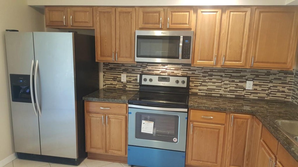 Photo of 9825 NW 56th Place, Coral Springs, FL 33076 (MLS # F10513758)