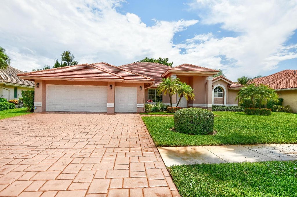 Photo of 10448 Milburn Lane, Boca Raton, FL 33498 (MLS # R10993789)