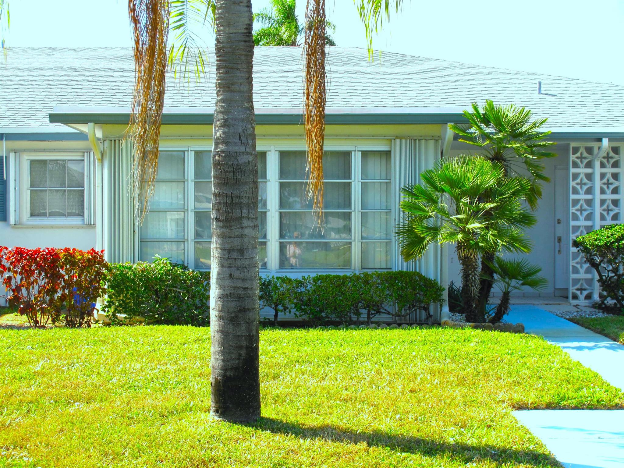 Welcome to your new piece paradise. Great location of this well maintained, bright and spacious 1BR1.5BA villa nestled in a 55+ comm. Villa features: AC Feb/2010, Roof installed April/2017, accordion shutters, Newer refrigerator, Updated kitchen backsplash. offered partially furnished. Enjoy Florida living at its best in this active community where you'll enjoy many planned social activities, game night, traveling, large heated resort style salt water pool and clubhouse. a Located closed to all amenities, just minutes to the beach and downtown Delray where you'll discover quaint shops, open air cafes, fine restaurants, shopping malls, theaters, close to I95/Turnpike and places of worship. You'll find a coin operated washer/dryer laundry room in each building of 4 units.