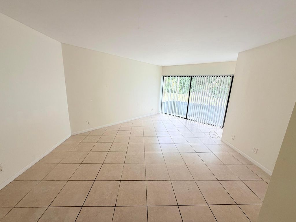 Photo of 2000 N Congress Avenue #103, West Palm Beach, FL 33401 (MLS # B26007240)