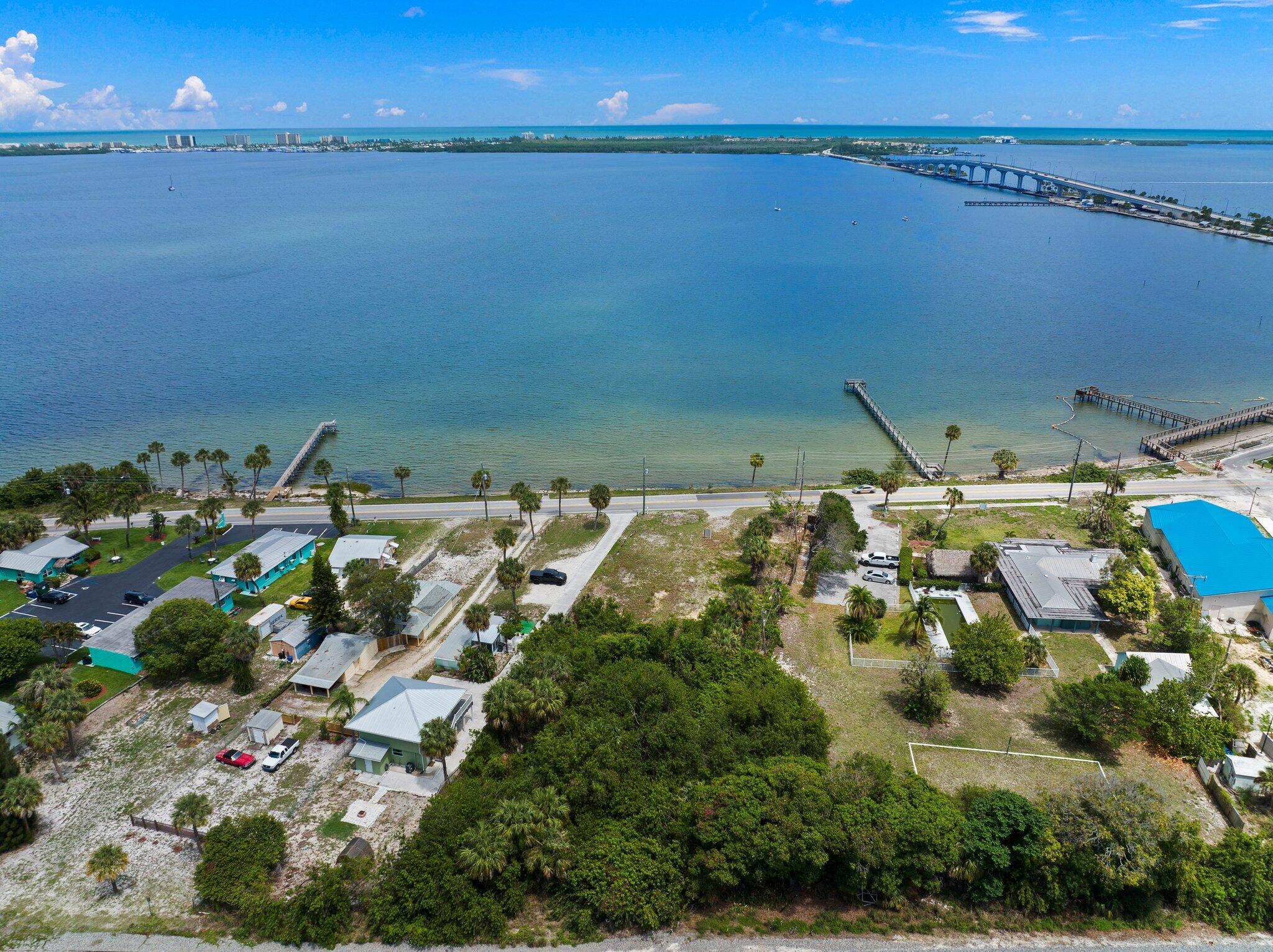 Rare waterfront lot with spectacular unobstructed views. Over 100 ft of Frontage with Riparian Rights. Less than a mile to shopping, dining, boat ramps, fishing pier, downtown, & the beach. Zoned R-3A with future Limited Commercial use. This .71 acre property extends well beyond the tree line. It is one of the few vacant waterfront parcels in Martin County, with proximity to Jensen Beach Business District and the causeway. Ideal for building a commercial investment property or dream home. Future Limited Commercial allows for 83 permitted uses. Public water & sewer available, along with excellent schools. Dont miss out on this rare investment opportunity.