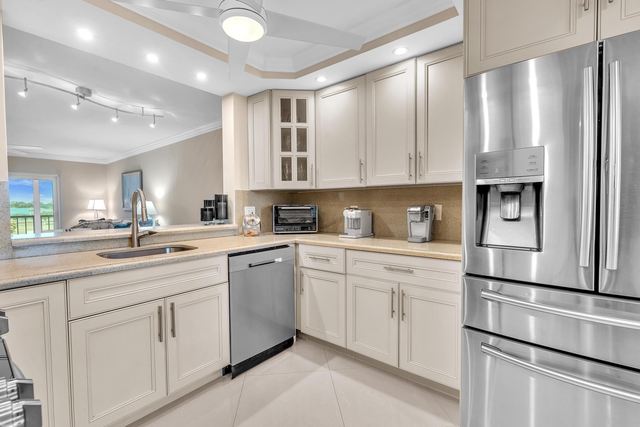 One-of-a-kind, turnkey 2 bed/2 bath END UNIT condo in the highly sought after Huntington Lakes! No detail has been overlooked in this decorator's showcase, featuring top-of-the-line finishes, FULL IMPACT WINDOW and DOORS, crown molding, stainless steel appliances, French doors in the primary suite, and exceptional craftsmanship thru-out. Meticulously maintained and move-in ready, with breathtaking pool & lake views from your private lanai. Located in a premier 55+ community with a brand new clubhouse offering state-of-the-art fitness center, five pools, theater, art room,tennis & pickleball courts, a vibrant calendar of clubs & activities. Just minutes from Downtown Delray with award-winning restaurants, boutique shopping, and pristine beaches.This is the lifestyle you've been waiting for