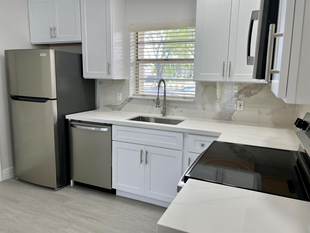 Photo of 10821 N Military Trail #7, Palm Beach Gardens, FL 33410 (MLS # R11113918)