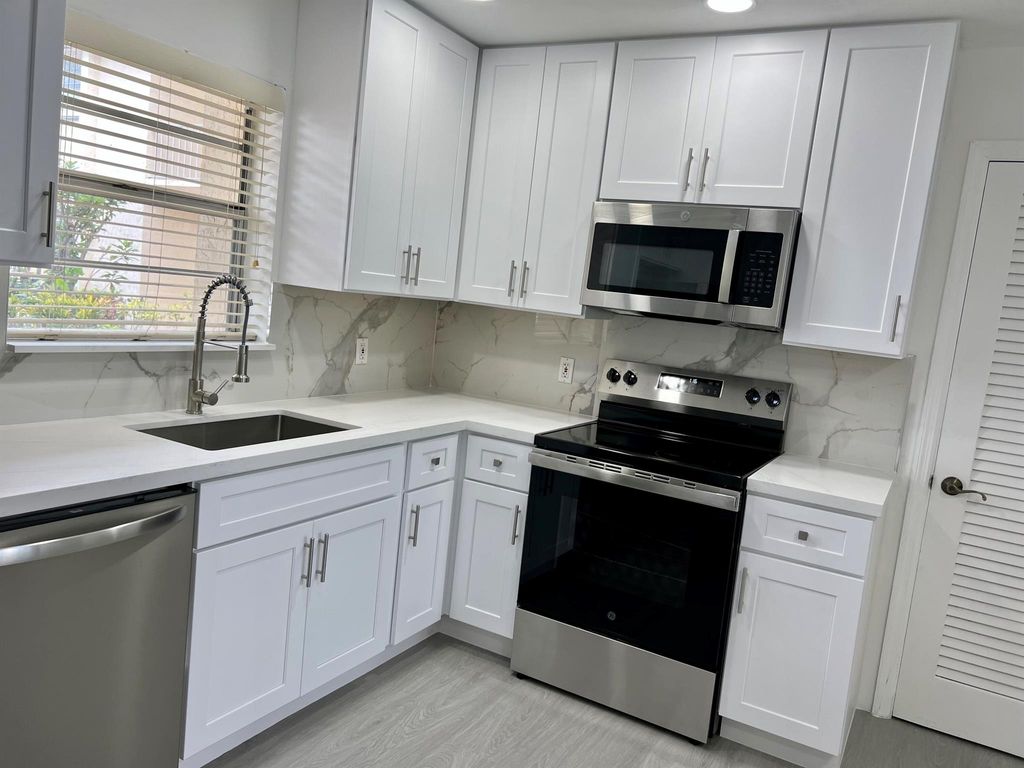 Photo of 10821 N Military Trail #7, Palm Beach Gardens, FL 33410 (MLS # R11113918)