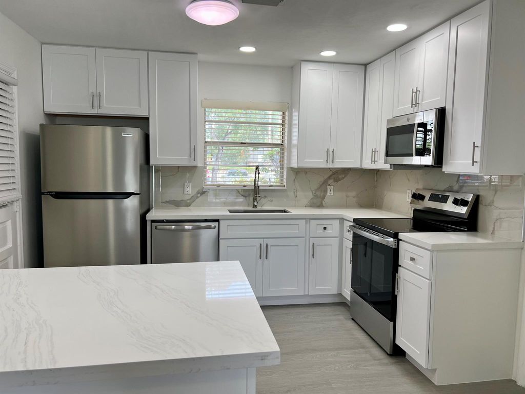 Photo of 10821 N Military Trail #7, Palm Beach Gardens, FL 33410 (MLS # R11113918)