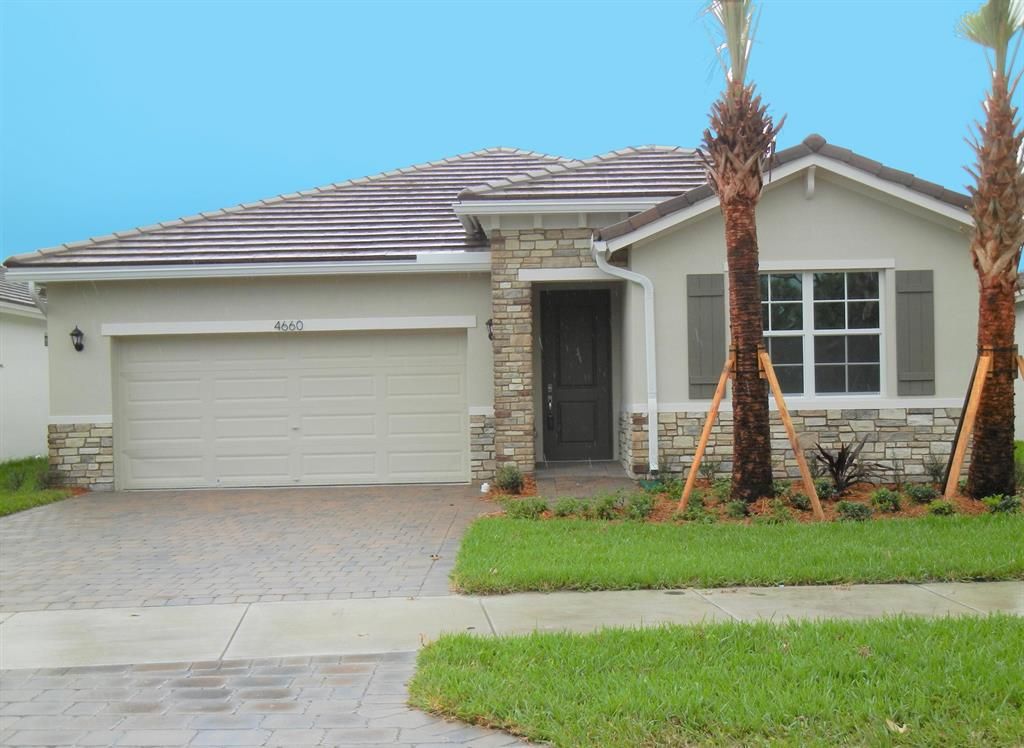 Photo of 4660 NW Exchange Avenue, Jensen Beach, FL 34957 (MLS # R10757279)