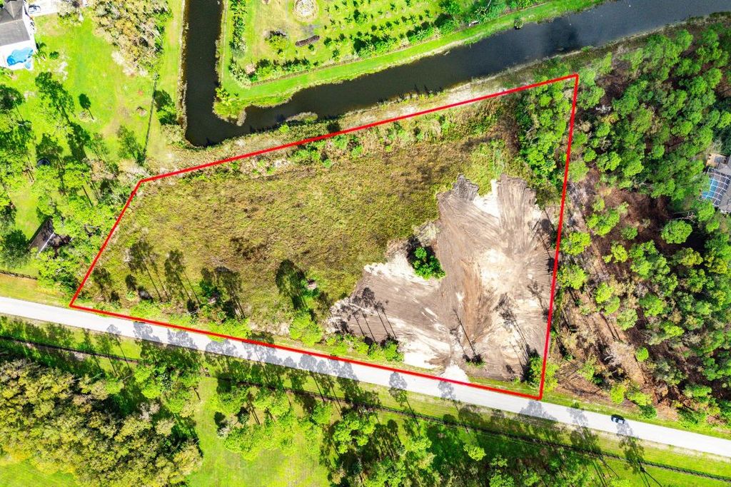 Photo of 6269 Wild Orchid Trail, Lake Worth, FL 33449 (MLS # R11136742)