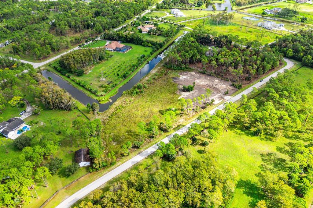 Photo of 6269 Wild Orchid Trail, Lake Worth, FL 33449 (MLS # R11136742)