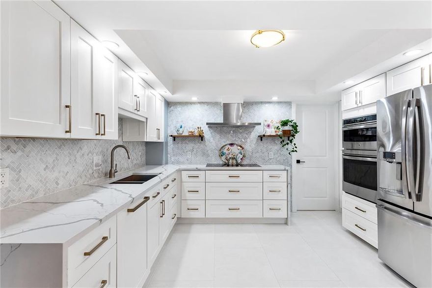 A rare gem!!  Elegantly renovated and direct ocean views. This northeast unit has been fully renovated from floor to ceiling. The large L-shaped balcony provides great outdoor space and views. The split-bedroom plan includes two master suites each with an ensuite bathroom, walk-in closet, and ocean view. New kitchen cabinets, 47" x 23.5" porcelain flooring throughout, and a full-size Samsung washer and dryer. Garage space included and plenty of guest parking. Amenities include a movie room, billiards room, ocean lounge community room, heated Infinity pool, 3 exercise rooms, and more. Please view the 3-D Matterport tour to walk through the unit virtually and get an overview of the floor plan and layout of the property. Additional information about the unit and building is under Attachments.