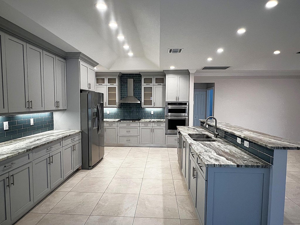 Photo of 349 SW Dagget Avenue, Port Saint Lucie, FL 34953 (MLS # B26047436)
