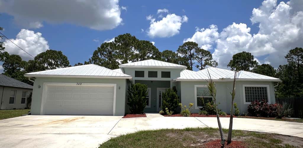 Photo of 349 SW Dagget Avenue, Port Saint Lucie, FL 34953 (MLS # B26047436)