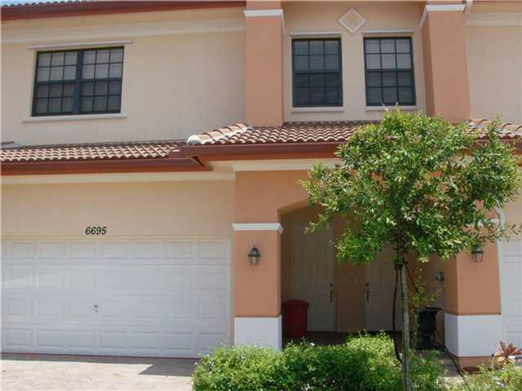 Photo of 6695 SE Woodmill Pond Lane, Stuart, FL 34997 (MLS # R10880758)