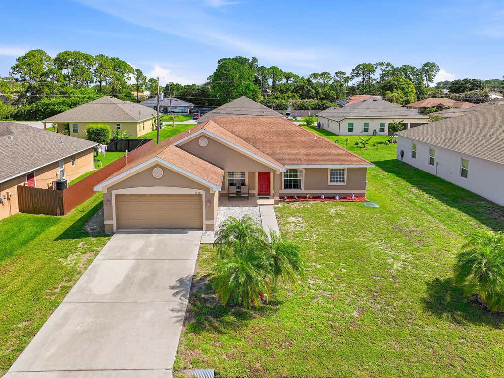 Photo of 1781 SW Starman Avenue, Port Saint Lucie, FL 34953 (MLS # B26049490)