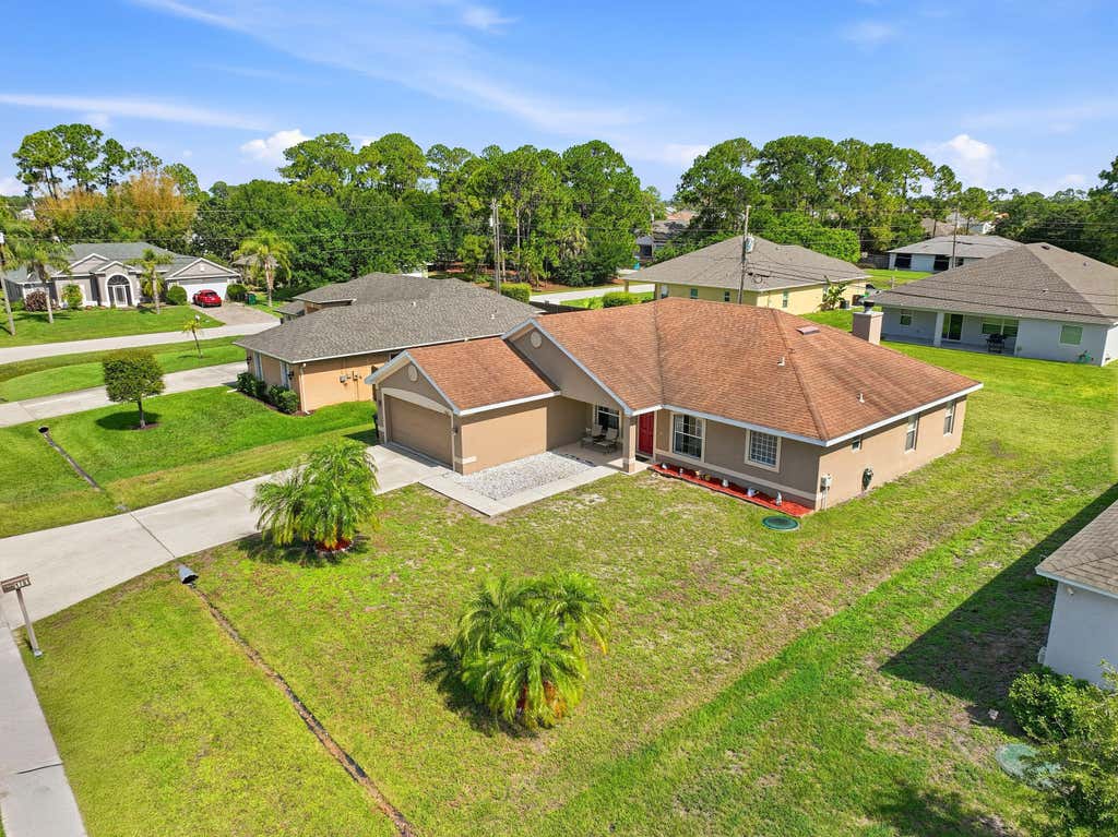Photo of 1781 SW Starman Avenue, Port Saint Lucie, FL 34953 (MLS # B26049490)