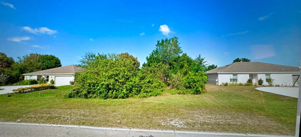 Photo of 3875 SW Port Saint Lucie Boulevard, Port Saint Lucie, FL 34953 (MLS # B26042717)