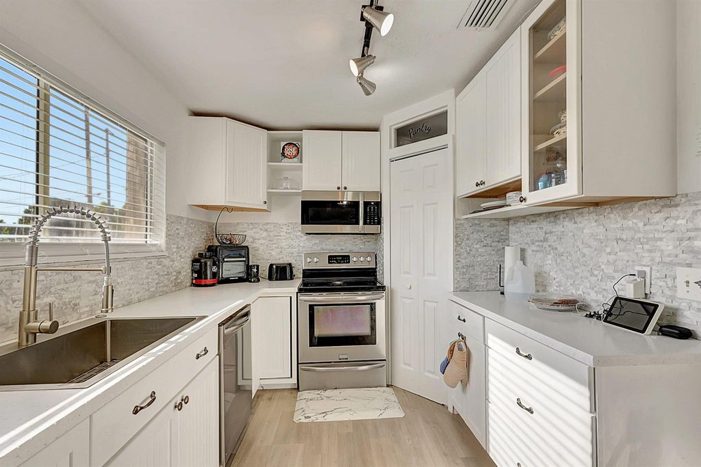 Photo of 3002 SE Sumner Lane, Port Saint Lucie, FL 34952 (MLS # R10950678)