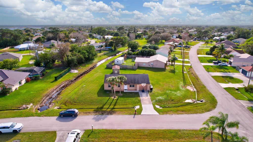 Photo of 3002 SE Sumner Lane, Port Saint Lucie, FL 34952 (MLS # R10950678)