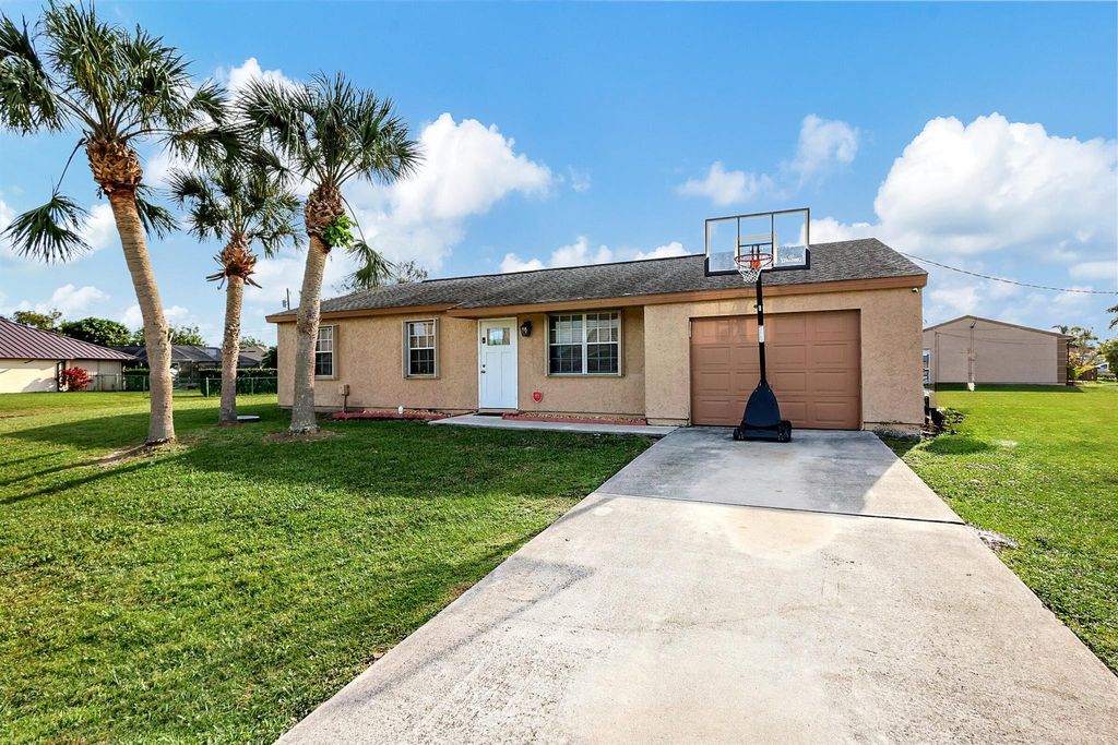 Photo of 3002 SE Sumner Lane, Port Saint Lucie, FL 34952 (MLS # R10950678)