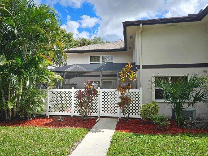Welcome to your beautifully updated 2BR/2.5BA DiVosta townhome in Stamford at Royal Palm Beach. This move-in ready home features a new roof, granite kitchen countertops, new appliances, new washer and dryer, new flooring downstairs, and a fully remodeled master bath with granite and under-cabinet lighting. Upstairs has impact windows, and downstairs includes hurricane shutters and a private screened lanai. The low HOA covers roof maintenance, internet, outside insurance, landscaping, pool, reserves, trash, and handyman services. Community pool and mailboxes recently updated. Conveniently located near shopping, dining, parks, and Madison Green Golf Club, just 15 minutes from Palm Beach International Airport.