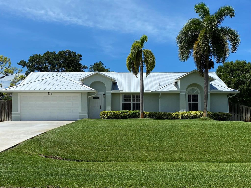 Photo of 237 SW Moselle Avenue, Port St Lucie, FL 34984 (MLS # R10894664)