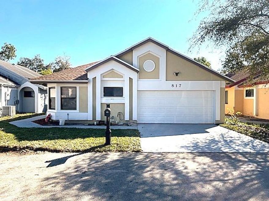 Completely renovated. Everything brand new. Granite countertop; stainless steel appliances; brand new air-conditioner; brand new washer and dryer; brand new master bath and guest bath. new grass with new sprinkler system. completely fenced. Unit close to all major highways - state room 7 and turnpike. This is a turnkey unit. come with your furniture and move-in same day you close. Close to great restaurants and many entertainment centers. Minimal Association dues at $60 a month.