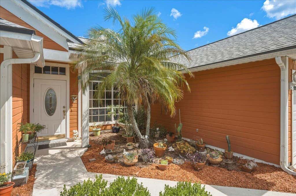 Photo of 437 SW Kaabe Avenue, Port Saint Lucie, FL 34953 (MLS # B26041411)