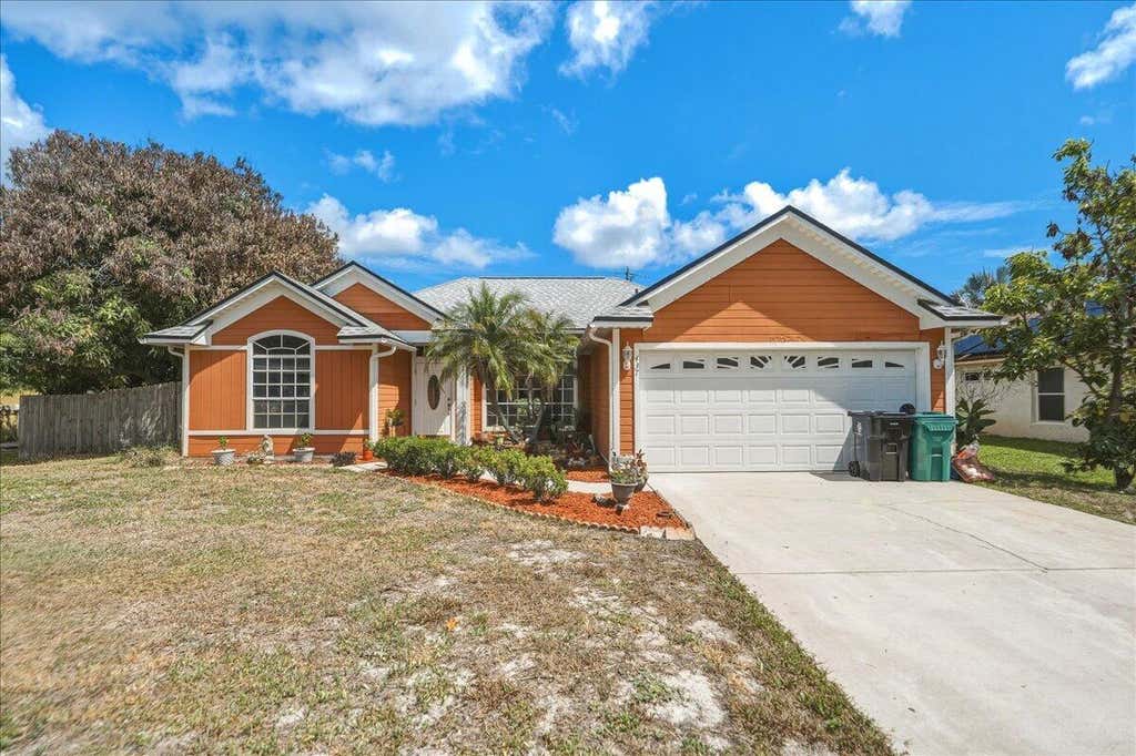 Photo of 437 SW Kaabe Avenue, Port Saint Lucie, FL 34953 (MLS # B26041411)