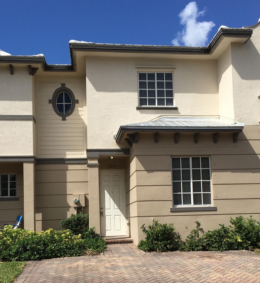 Spacious 3-bedroom, 3-bath townhome featuring a flexible floor plan with one bedroom and a full bathroom on the first floor and two bedrooms upstairs, each with their own private full bath. The kitchen and living areas feature tile flooring, along with a pantry for additional storage. The home also includes a washer and dryer and a covered patio ideal for relaxing outdoors. Located in a 24-hour guard-gated community, residents enjoy convenient access to the clubhouse, resort-style pool, fitness center, tennis courts, and playground, all within walking distance. The HOA fee includes cable TV, water, sewer, trash service, security, and maintenance of the common areas and grounds, offering low-maintenance living in a well-maintained community.