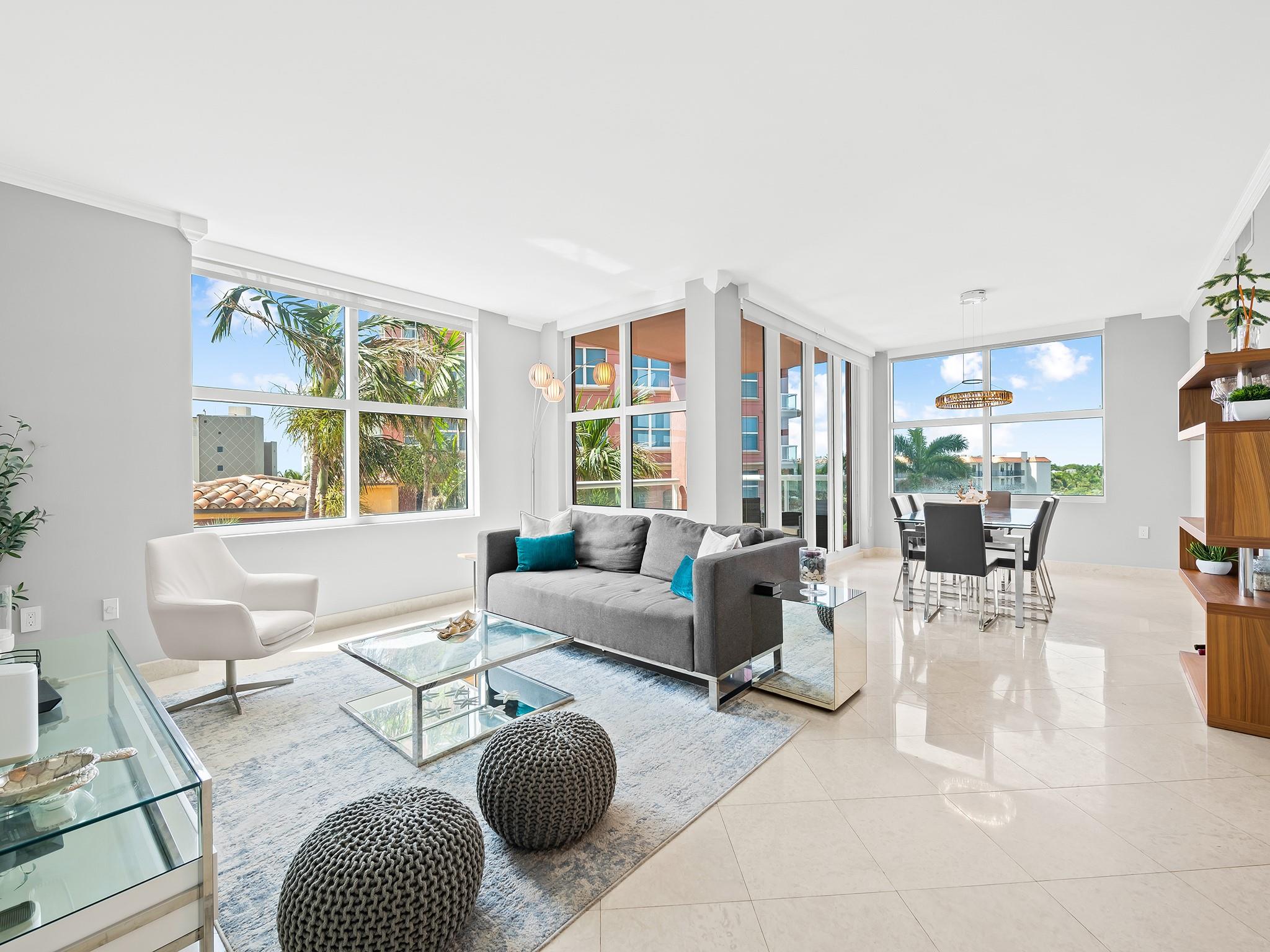 The Palms is an exclusive oceanfront residence offering refined coastal living with resort-caliber amenities. This elegantly fully furnished updated corner unit showcases an open flr plan with ocean views from the great rm & primary suite. The eat-in kitchen features newer appliances, designer countertops, & exceptional storage, seamlessly connecting to the dining area, spacious great rm & a covered balcony for indoor-outdoor entertaining. The primary suite offers a generous walk-in closet & a spa-inspired bathrm. A versatile 2nd bedrm serves perfectly as a guest rm or executive office, with an adjacent renovated bathrm. Enjoy 24-hour security, valet, two pools, fitness center, tennis, basketball, sauna, steam, beach pavilion & more. Walking distance to restaurants. Sq Ft from MyCondoPlans