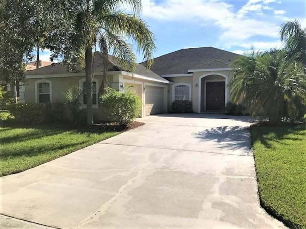 Photo of 438 NW Sunflower Place, Jensen Beach, FL 34957 (MLS # R10819380)