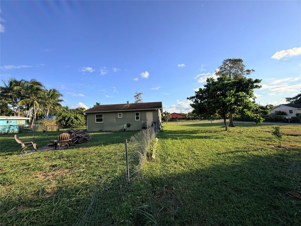 Photo of 5211 Pine Grove Dr, West Palm Beach, FL 33417 (MLS # F10533692)