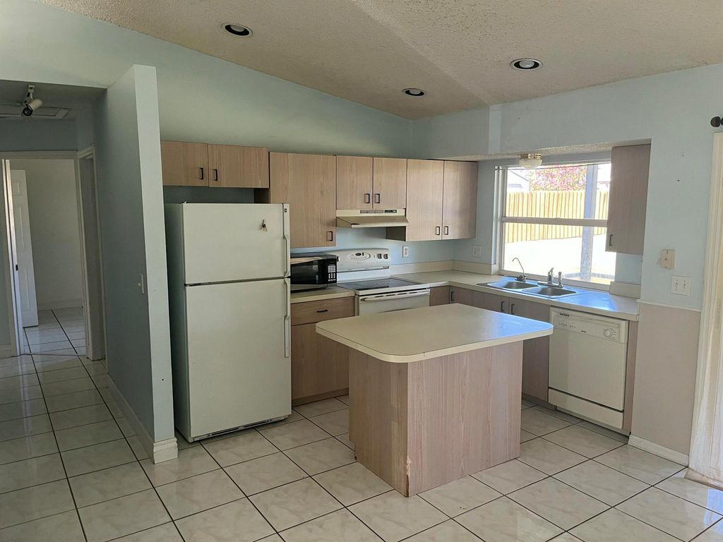 Photo of 2737 SE Helms Avenue, Port Saint Lucie, FL 34952 (MLS # R11121400)