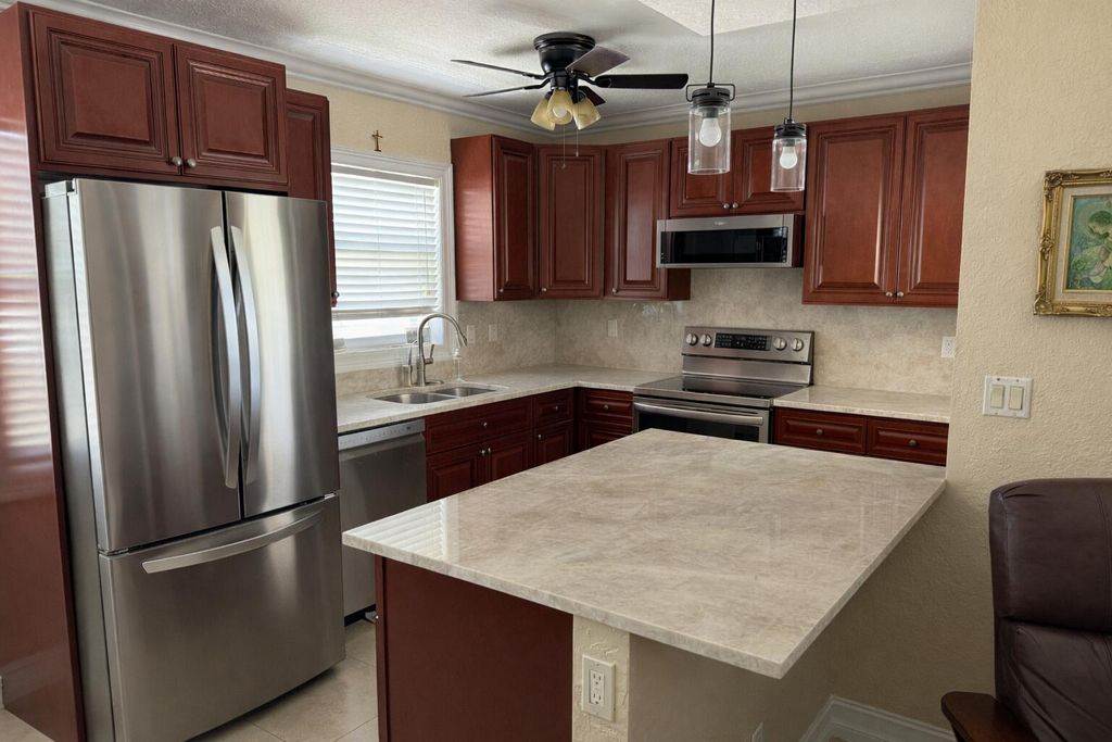 Photo of 1221 SE 3rd Street #4, Deerfield Beach, FL 33441 (MLS # B26017986)