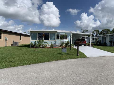 Photo of 8 Brisa Lane, Port Saint Lucie, FL 34952 (MLS # B26054107)